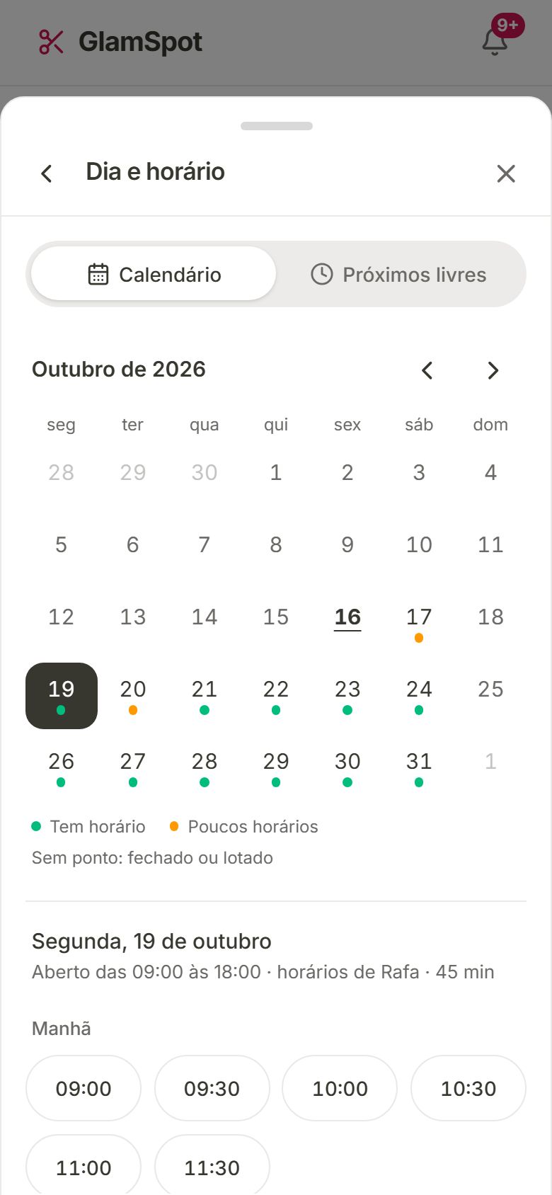 Calendário de outubro com pontos verdes e laranja embaixo dos dias e os horários livres da segunda, 19